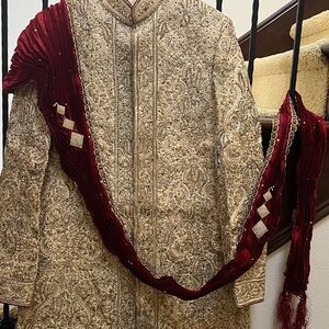 Manyavar- Lagan brand Men’s sherwani set with chudi pants and dupatta.